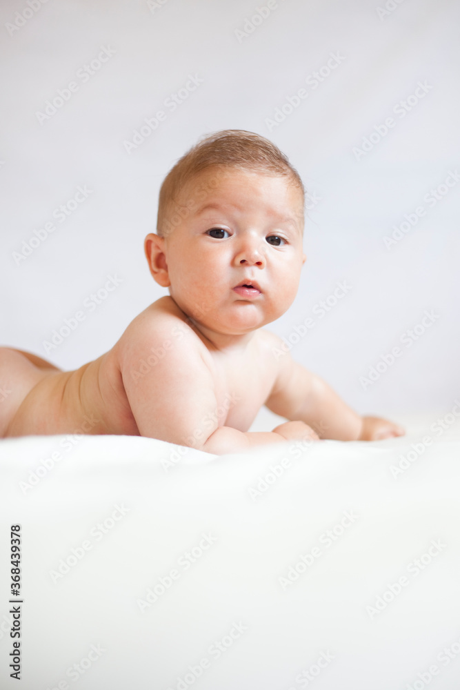 Portrait of a newborn baby against a white background Portrait of a newborn baby against a white background