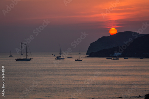 sunset with yahts on Santorini  island Greece