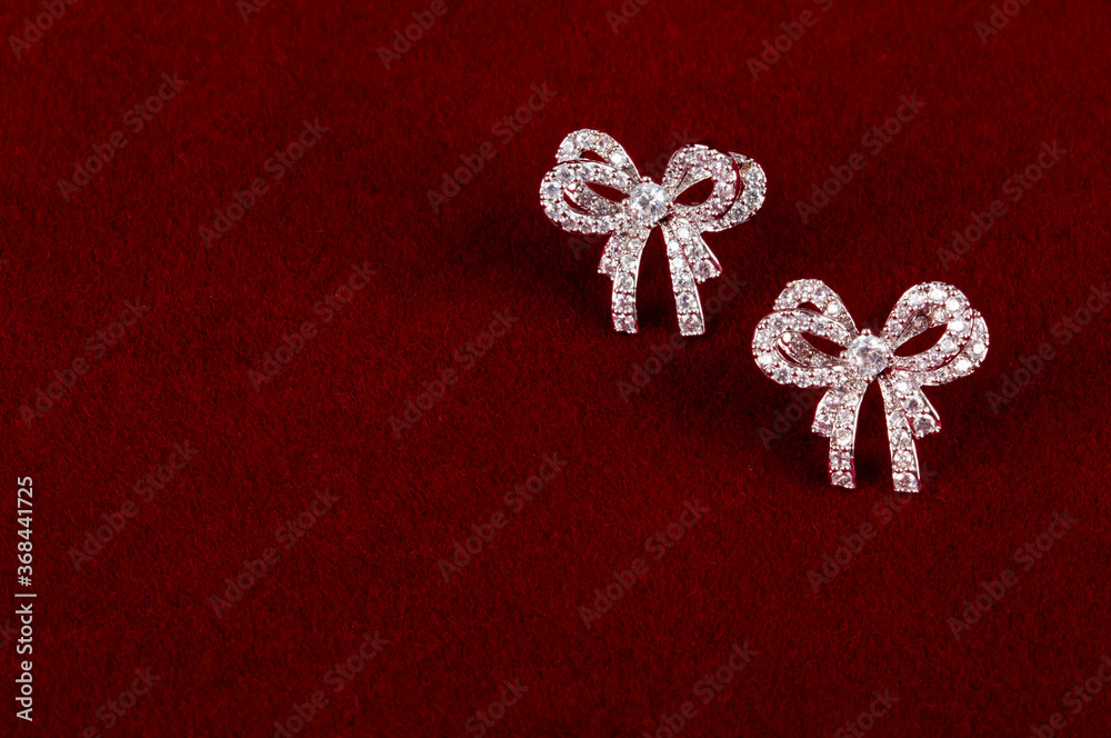 Close up of diamond earrings. space for your text. Close up of diamond earrings. space for your text.