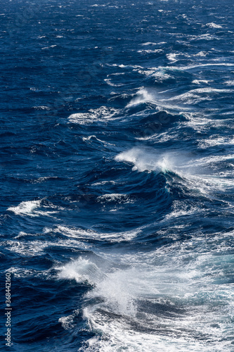 white waves in blue Mediterranean sea