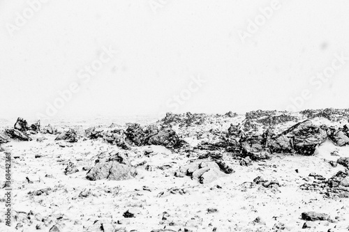 Desert lava terrain covered with snow 