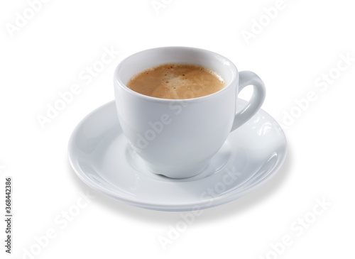 Angled view of a white expresso cup and saucer full of smooth expresso coffee, isolated on white photo
