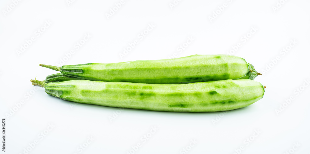 Fresh peeled loofah on white background Fresh peeled loofah on white background