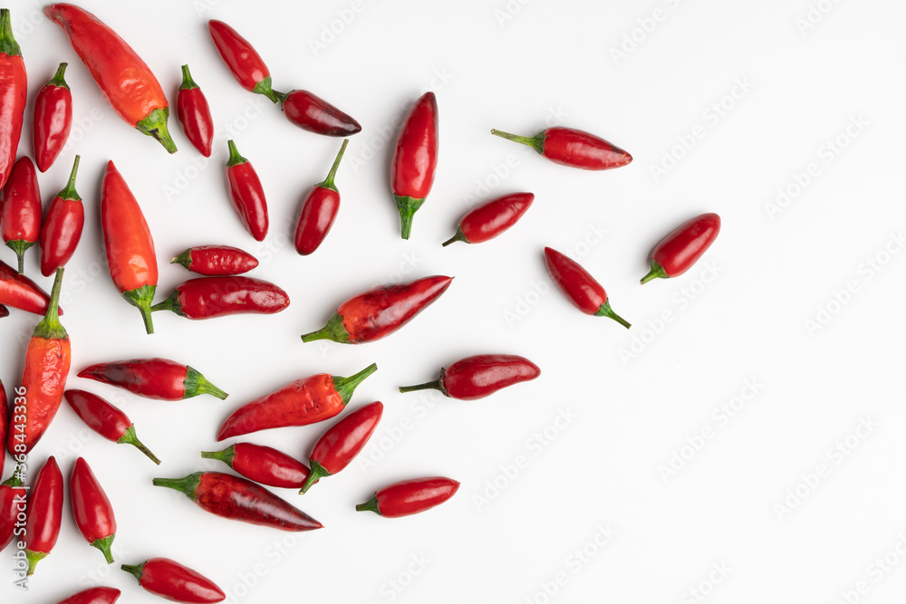 design of red chillies on a white background design of red chillies on a white background