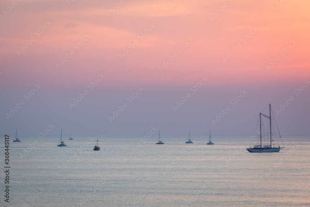 sunset with yahts on Santorini  island Greece