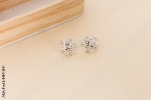 Close up of diamond earrings. space for your text.