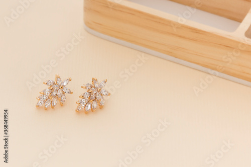 Close up of diamond earrings. space for your text.