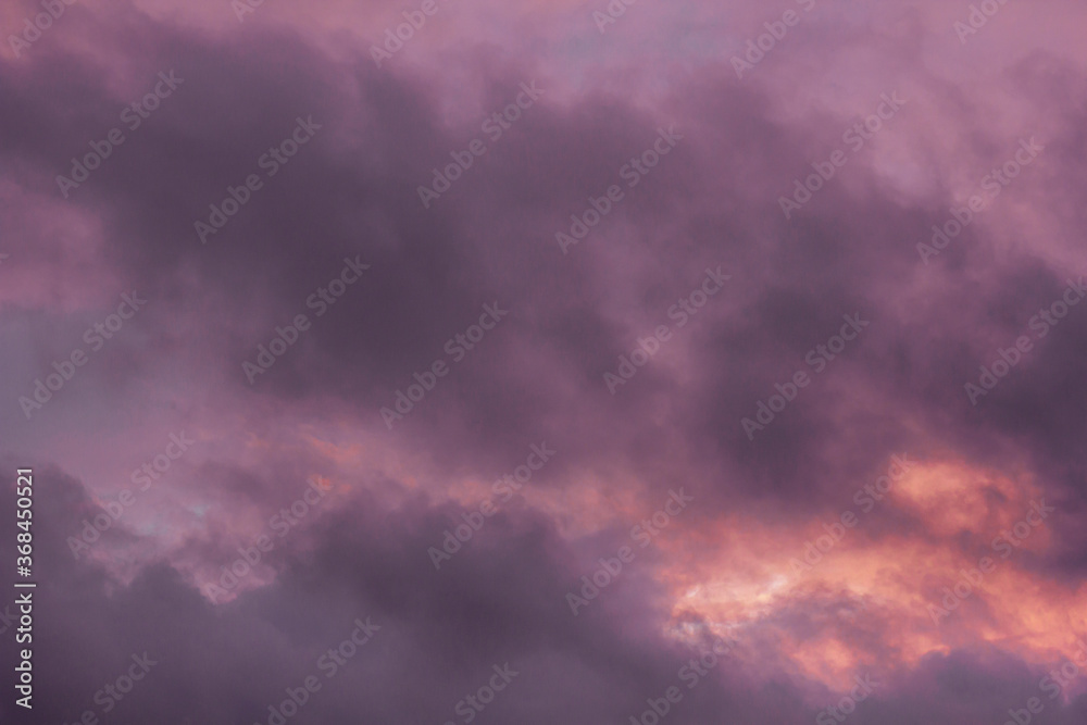 Colorful and beautiful view on stormy clouds. Abstract nature landscape background. Dramatic cloudscape in the sunset. Twilight with cloudy sky.