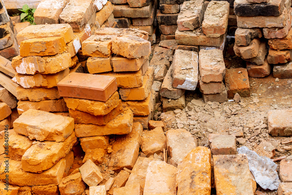 red bricks pile. stack for construction. Repair, industrial brickwork parts, construction equipment. red bricks pile. stack for construction. Repair, industrial brickwork parts, construction equipment.