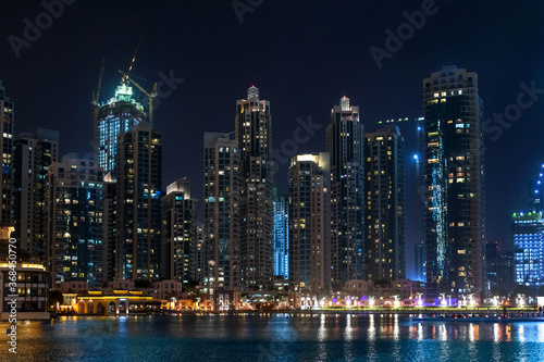 Skyscrapers in the Downtown Dubai at night, UAE © olgavolodina