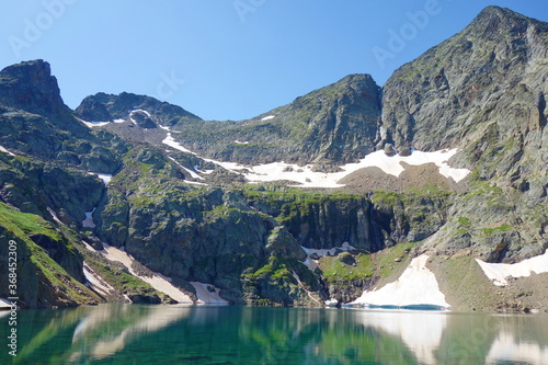 Mountain lake called Nere in Pyrenees mountains on a hiking trail GR10 located in France