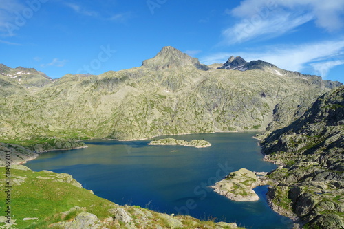 Fototapeta Naklejka Na Ścianę i Meble -  Mountain lake called Embalse Bachimana in Pyrenees on a hiking trail GR11/HRP in Spain