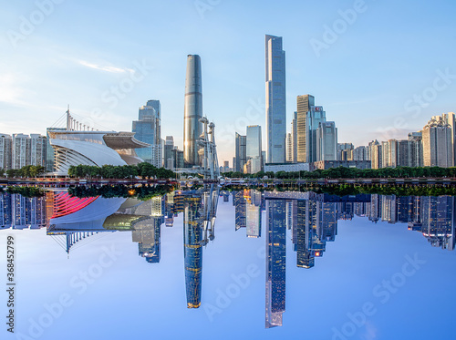 Mirroring scenery of Guangzhou city in day and night  China