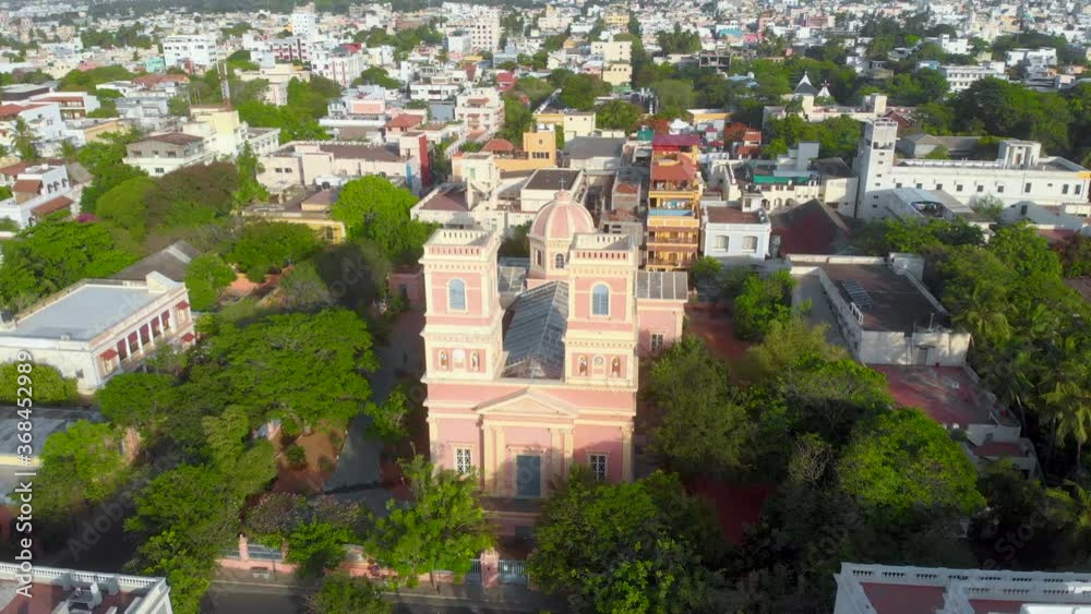 Top Angle Wide Orbital Shot of Our Lady Angeles Church on an early morning near the french town, Puducherry shot with a drone in 4k. Top Angle Wide Orbital Shot of Our Lady Angeles Church on an early morning near the french town, Puducherry shot with a drone in 4k.