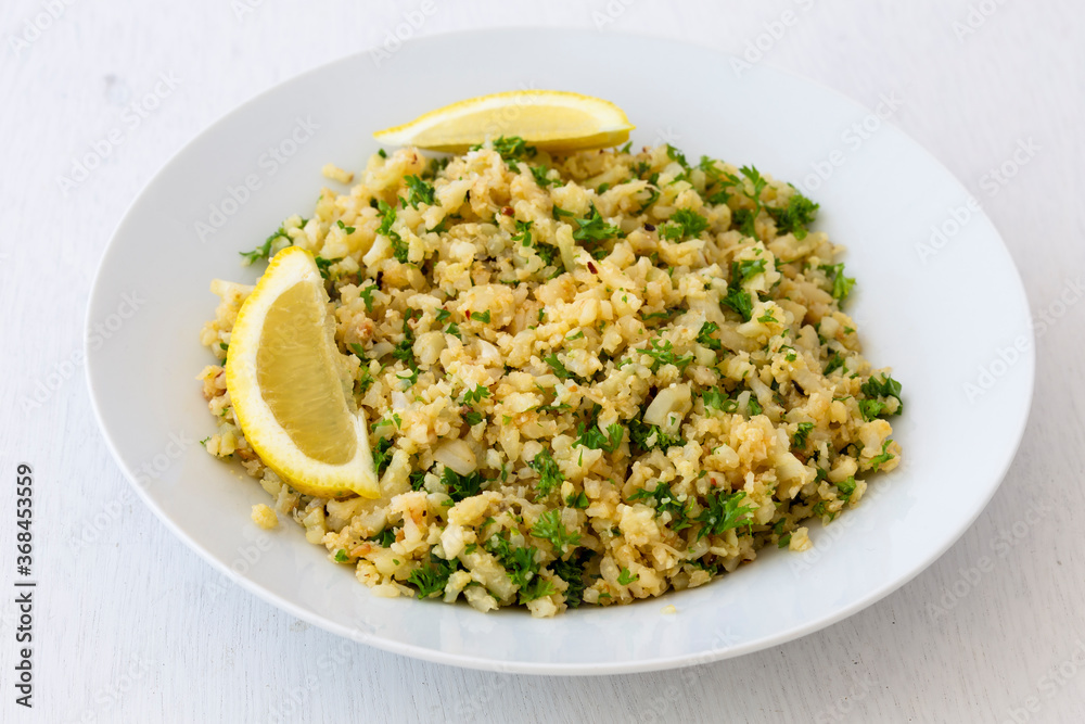 Cauliflower rice with finely chopped parsley