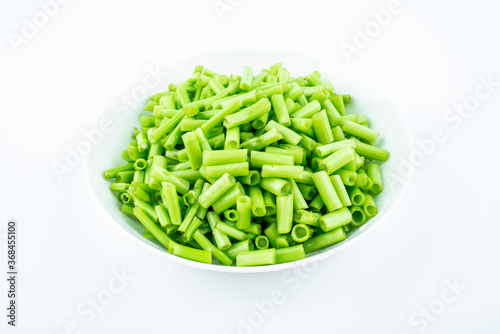 A dish of chopped water spinach sticks