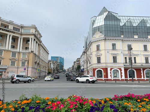 Vladivostok, Russia,  July, 22, 2020. Vladivostok, view of Okeansky Prospekt from Svetlanskaya street on a cloudy summer day photo