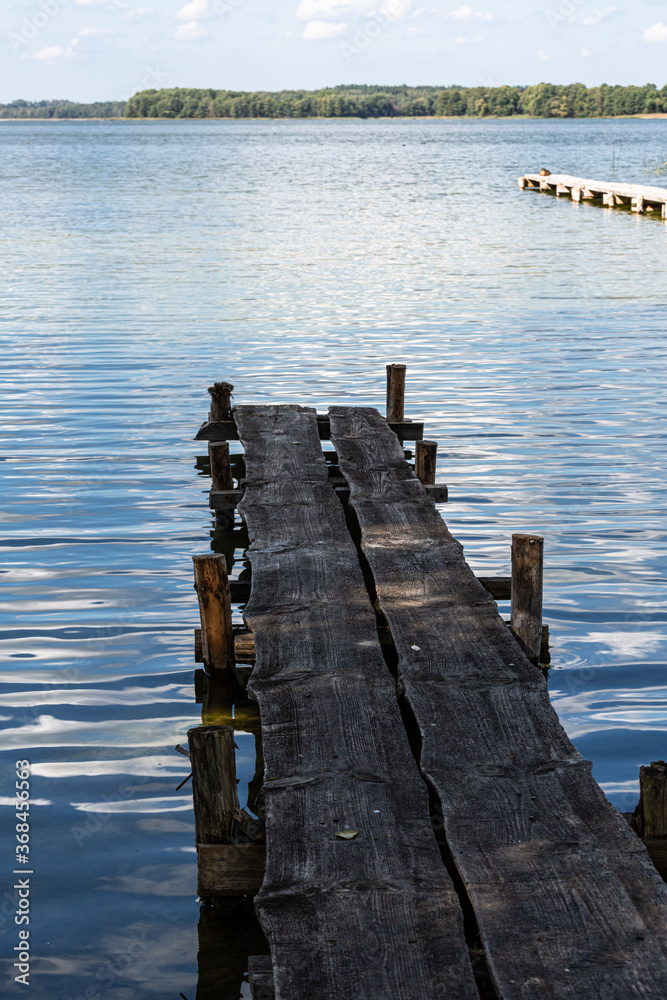 Fototapeta premium Boats and boat moorings on the lake
