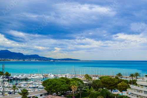 Landscape of the beautiful Marina Baie des Anges on against backdrop of Mediterranean Sea with yachts and sailboats. Villeneuve-Loubet. France. © jana_janina