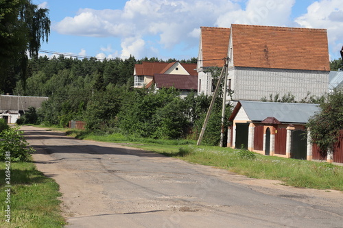 rural road with posh cottages view