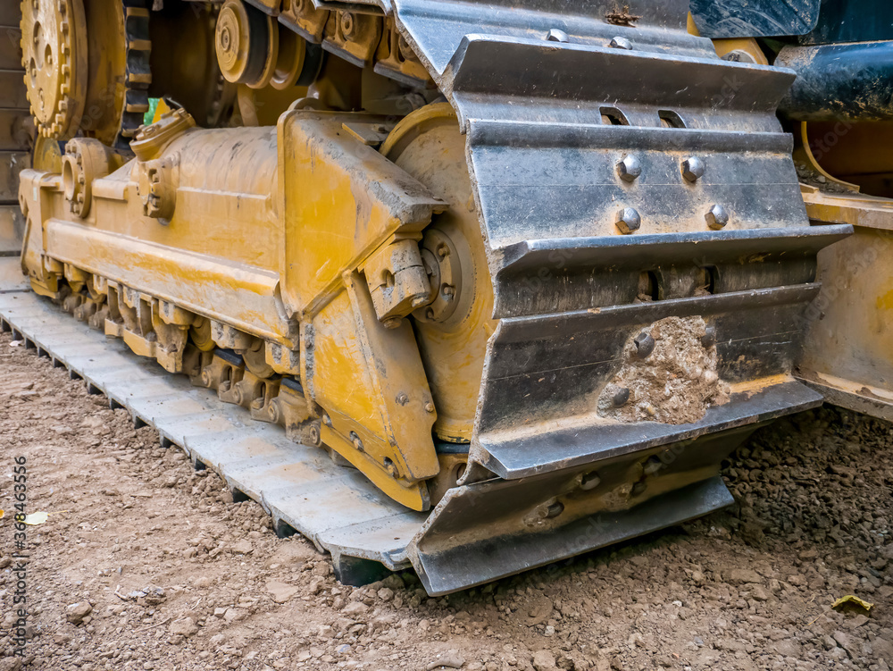 Close up detail with chain tracks of a bulldozer
