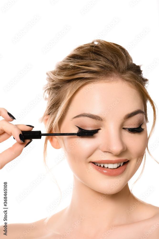 smiling naked beautiful blonde woman with makeup and black nails applying mascara isolated on white smiling naked beautiful blonde woman with makeup and black nails applying mascara isolated on white