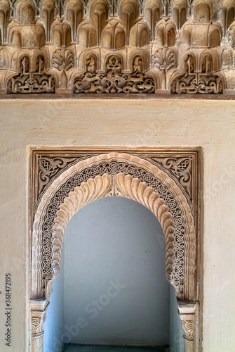 Fototapeta Naklejka Na Ścianę i Meble -  carved wall in Islamic Moorish Style in Alhambra, Granada, Spain