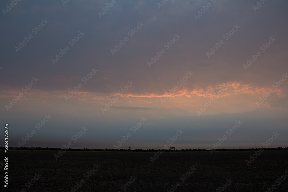 sunrise in a row of clouds sunrise in a row of clouds