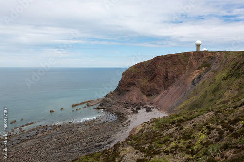 Devon coastline near Hartland Point with radar tower on clifftop