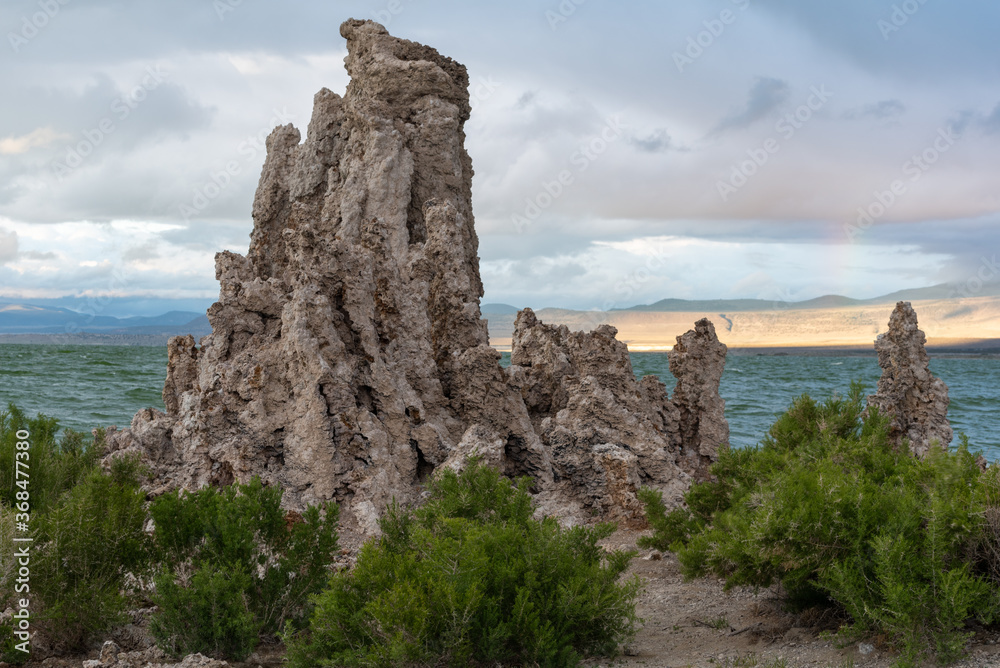 Close up on one tufa standing close to Lake Mono, a saline soda lake in California, on a cloudy day.