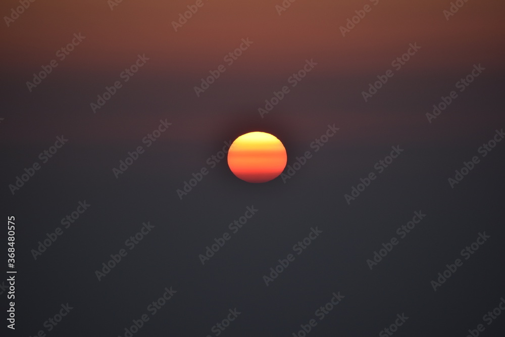 Beautiful orange sun at time of sunset
