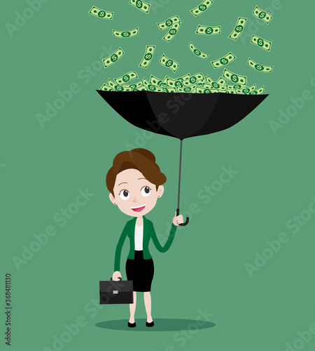 Businesswoman with umbrella and standing under the rain of money