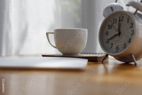 clock and cup of coffee