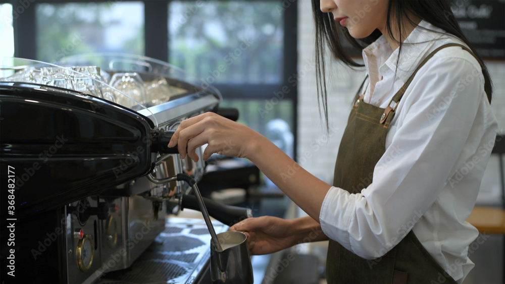 Coffee shop concept. Asian girls making coffee inside the counter. 4k Resolution.