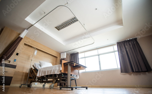 Fototapeta Naklejka Na Ścianę i Meble -  Recovery Room with bed and comfortable medical. Interior of empty hospital room.