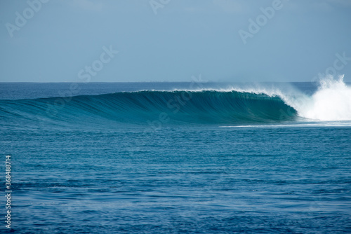 Perfect blue aquamarine wave, empty line up, perfect for surfing, clean water, Indian Ocean