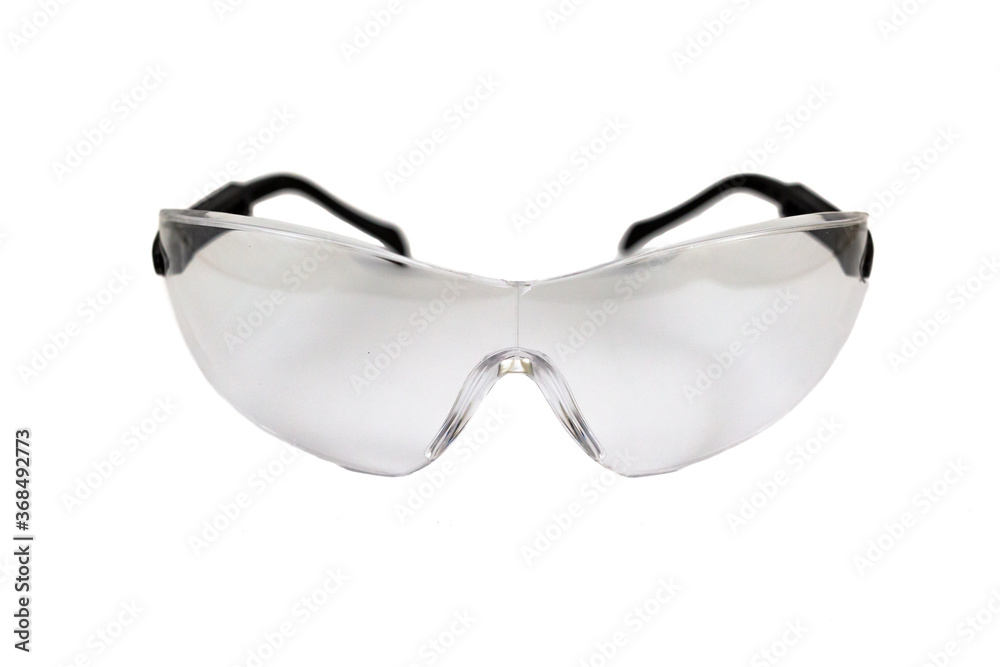 Safety glasses protecting eyes from laboratory accidents, surgical procedures, industrial plants as well as Corona Virus Spread. Isolated on white background. Safety glasses protecting eyes from laboratory accidents, surgical procedures, industrial plants as well as Corona Virus Spread. Isolated on white background.