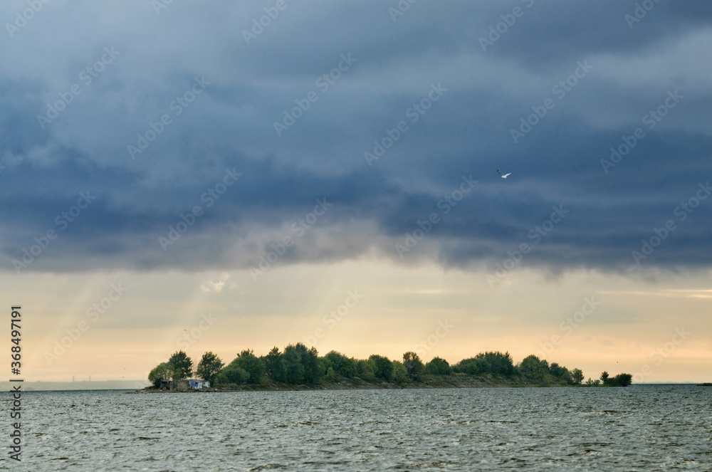 Thunderclouds in the sky over the sea.