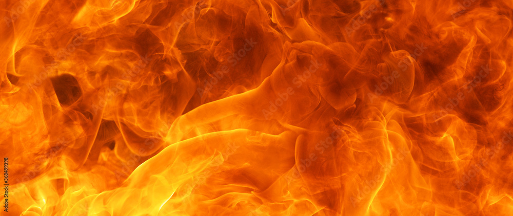 Fototapeta premium blaze fire flame conflagration texture for banner background, 64 x 27 ultra-widescreen aspect ratio