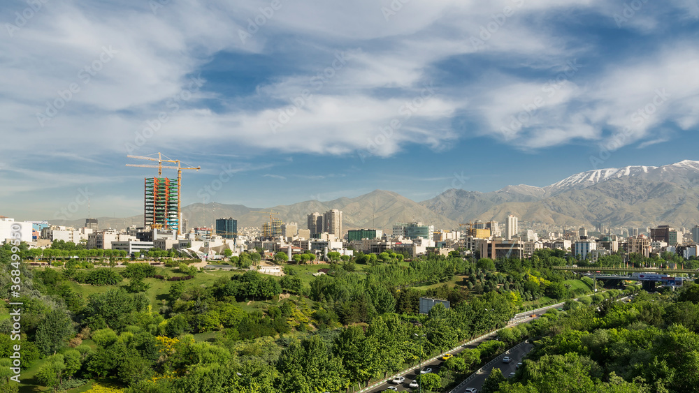  A view of Northern area of Tehran, capital city of Iran, with the Alborz mountain chain in background