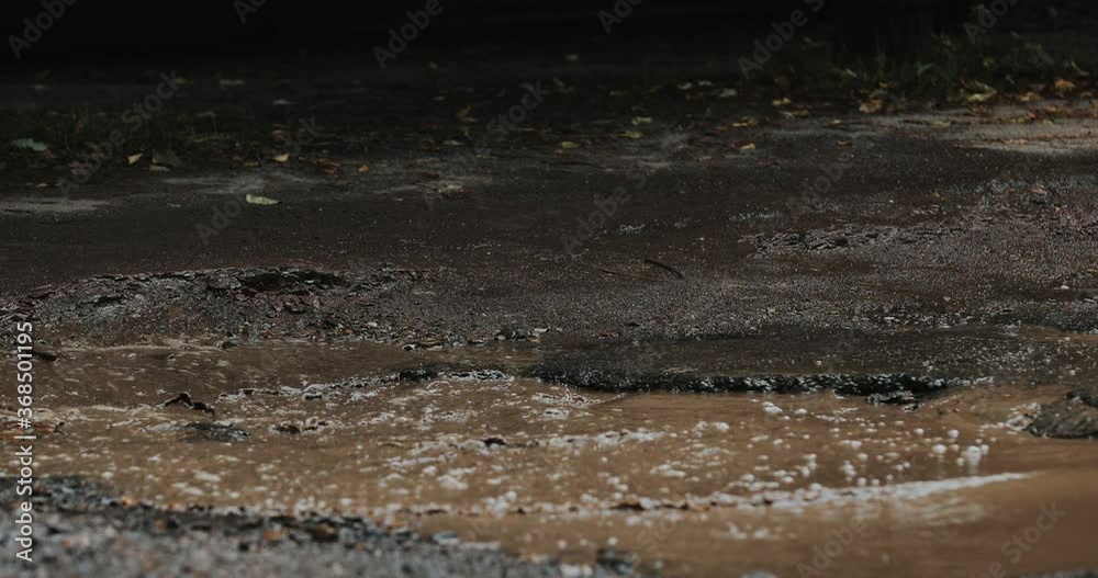 Car driving on impassibility of roads. A lot of mud Car driving on impassibility of roads. A lot of mud