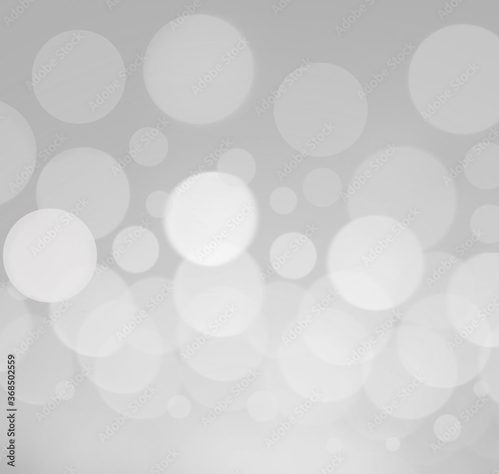 Abstract background,blurred lights bokeh on gray and white background.bokeh effect,Festive light background,gray and white  background