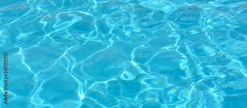 Blue water in swimming pool.Ripple Water. © syhin_stas