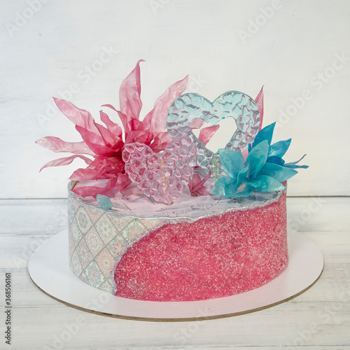 Pink blue sugar sheet cake with caramel and rice paper decoration