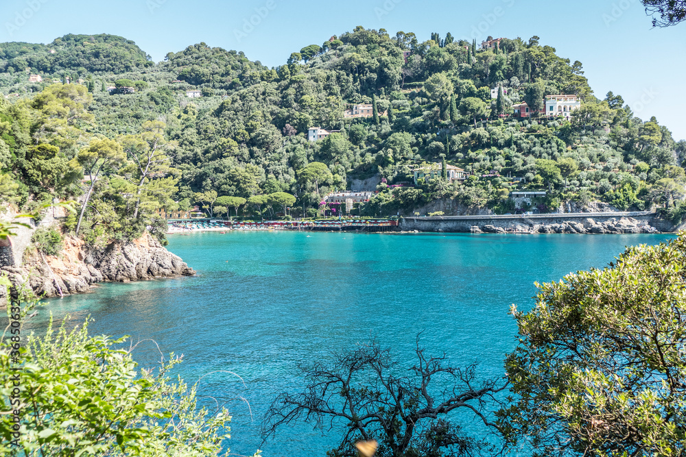 The bay of Paraggi in Portofino with green and transparent water