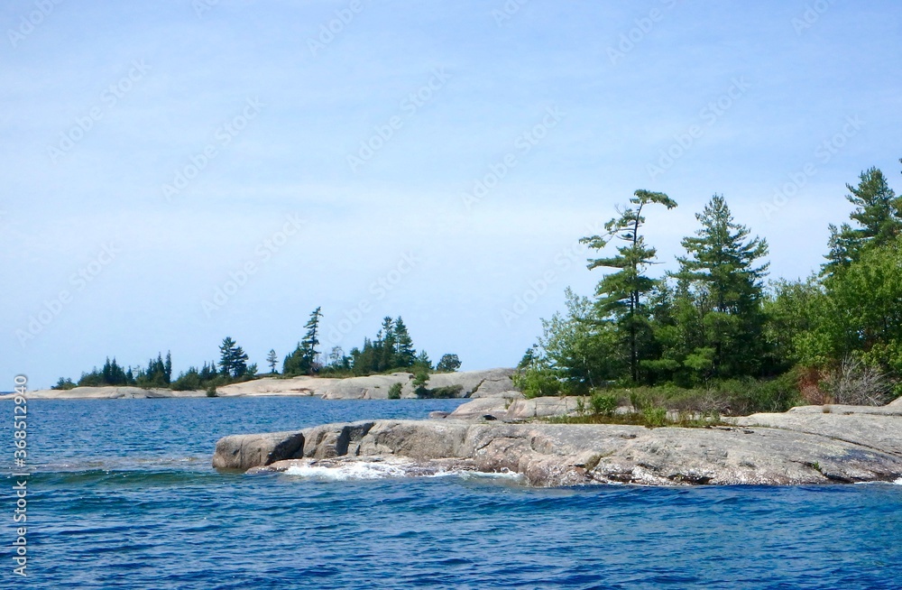 Fototapeta premium The beautiful rock formations and windswept pines of the Islands in Indian Harbour Georgian Bay Ontario Canda