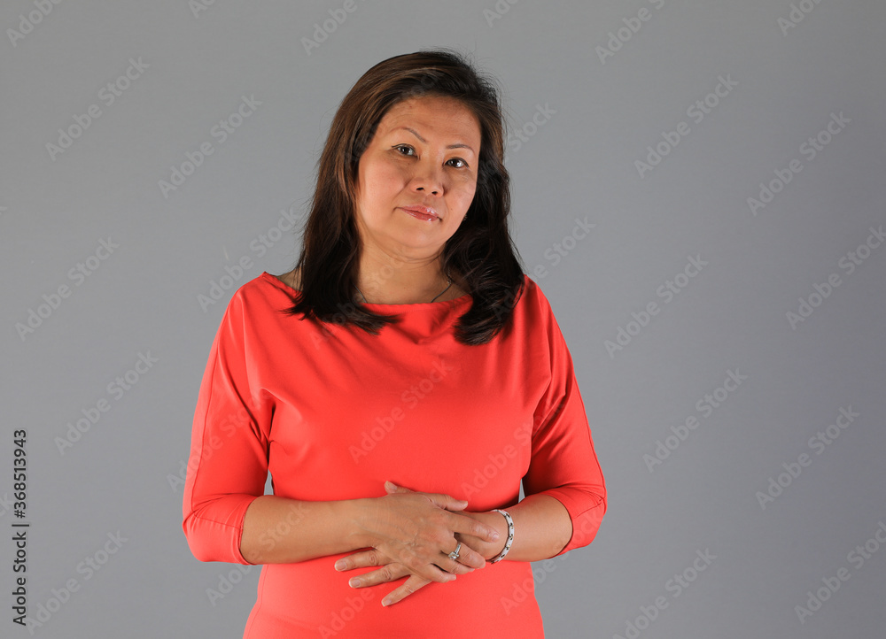 Obraz premium studio portrait of 40 years old thai woman