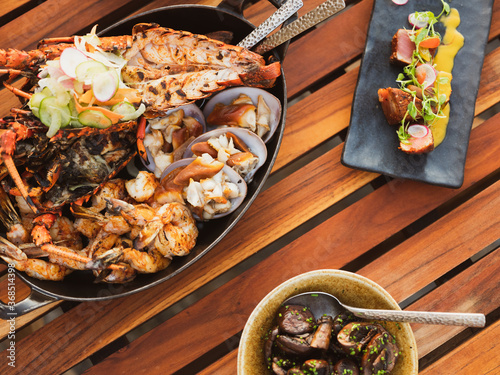 Top Down View of Gourmet Seafood on a Wood Table