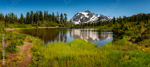 Fototapeta Naklejka Na Ścianę i Meble -  Picture Lake with Mount Shuksan in the Background. This Lake is the centerpiece of a strikingly beautiful landscape in the Heather Meadows area of the Mt. Baker recreation area.
