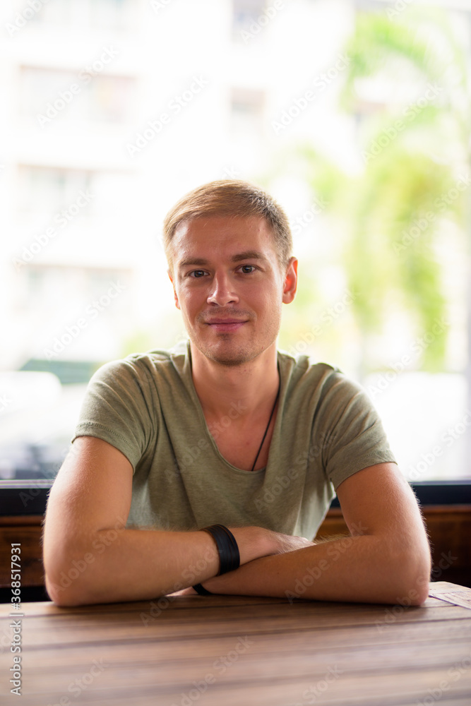 Handsome man relaxing in the coffee shop Handsome man relaxing in the coffee shop